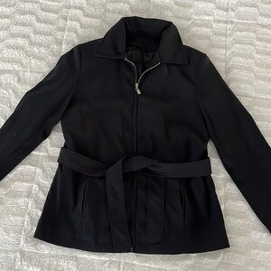 Women’s black coat with attached belt